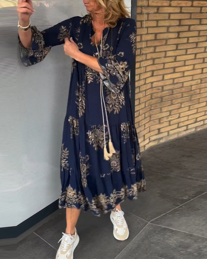 Vestido vintage con escote en pico y corte holgado.-ES