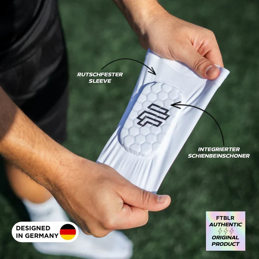 Chrániče nôh na futbal s plástovým plástom proti kolízii pre vonkajšie športy-SK